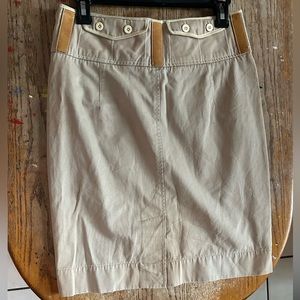 Selling a Ralph Lauren mini skirt, size 2, color is like a cream or tan color